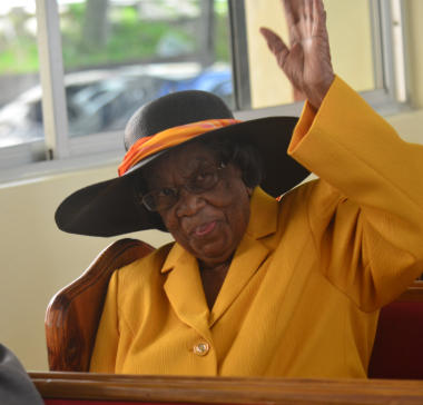 Centenarian Hazel Foster acknowledges the accolades piled on her while worshipping on her 100th birthday | Credits: Jerry Holness